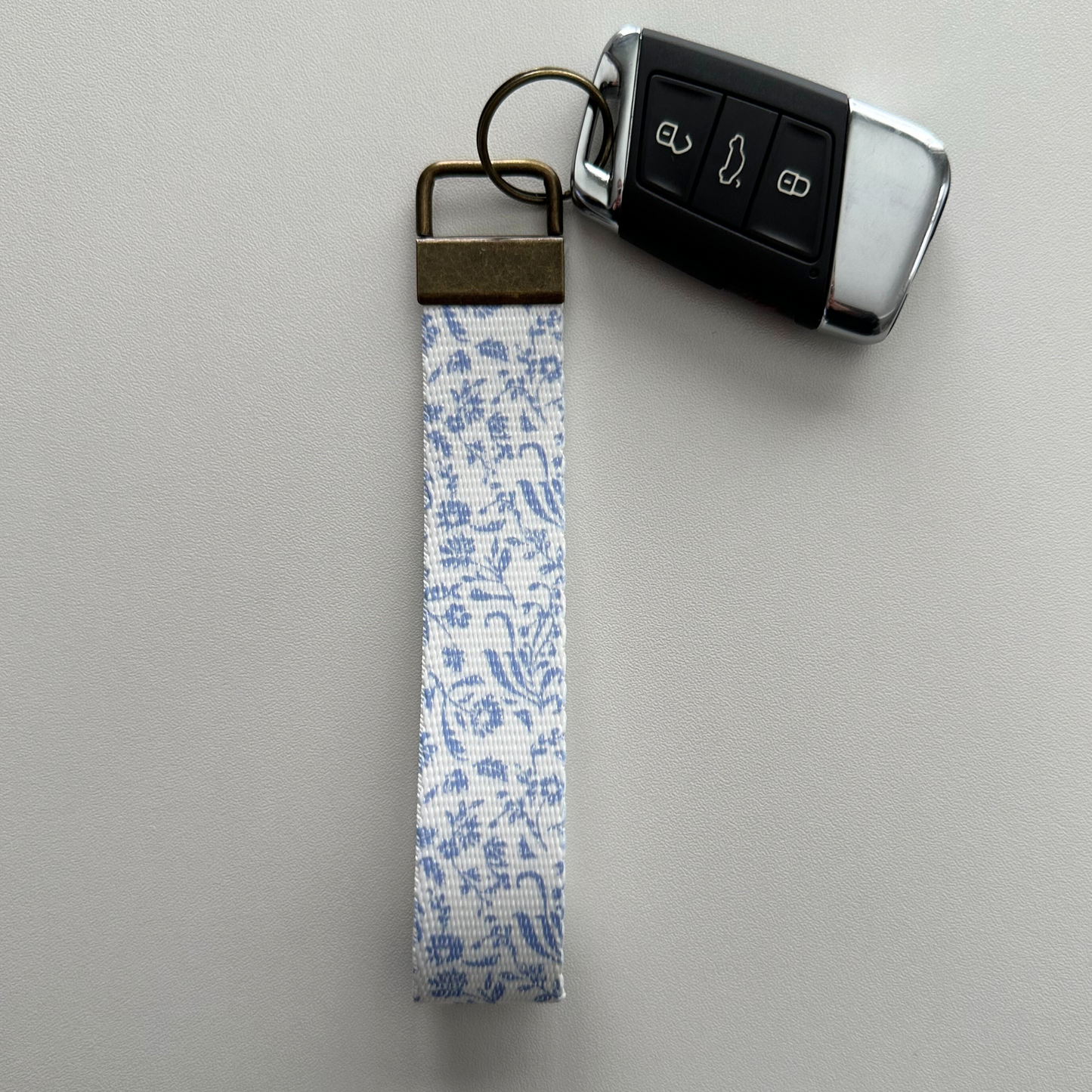 Blue Ditsy Floral Key Fob Wristlet | Antique Brass Hardware