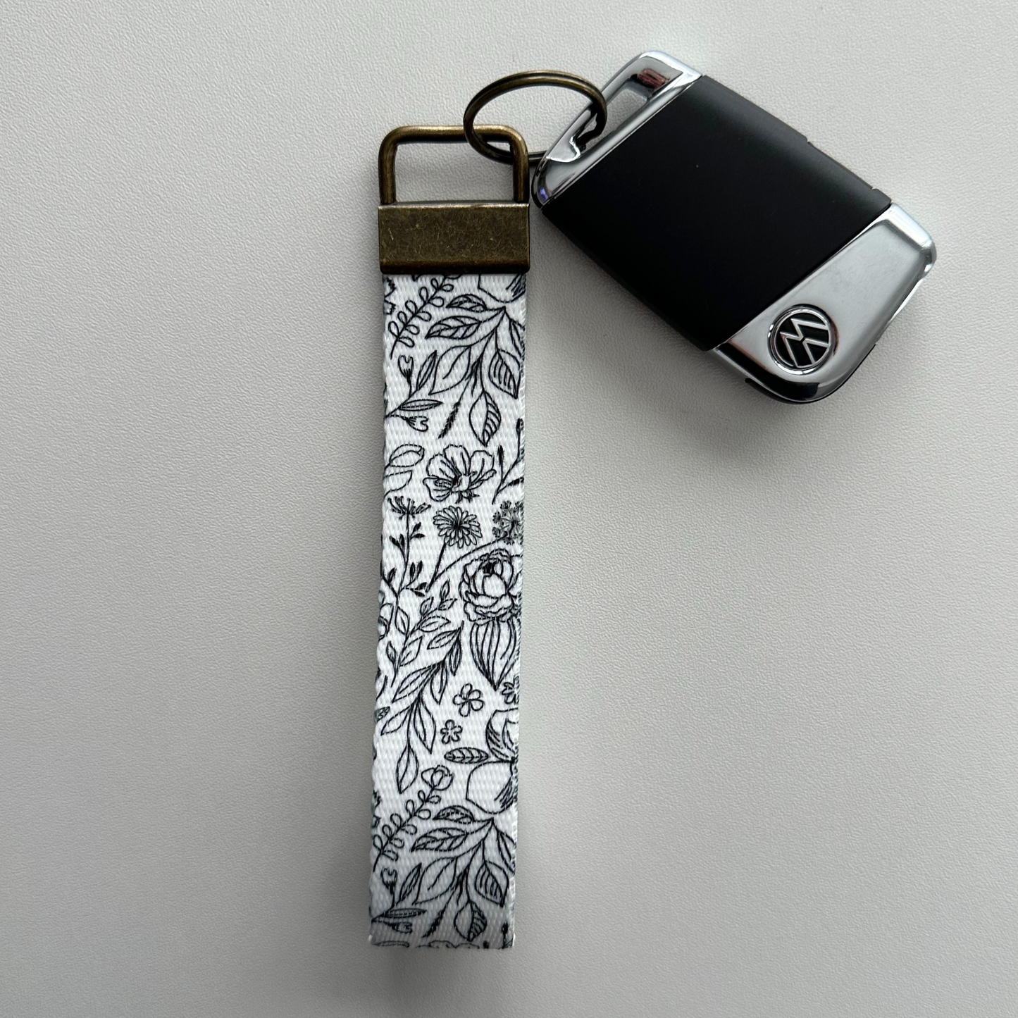 Black & White Floral Key Fob Wristlet | Antique Brass Hardware