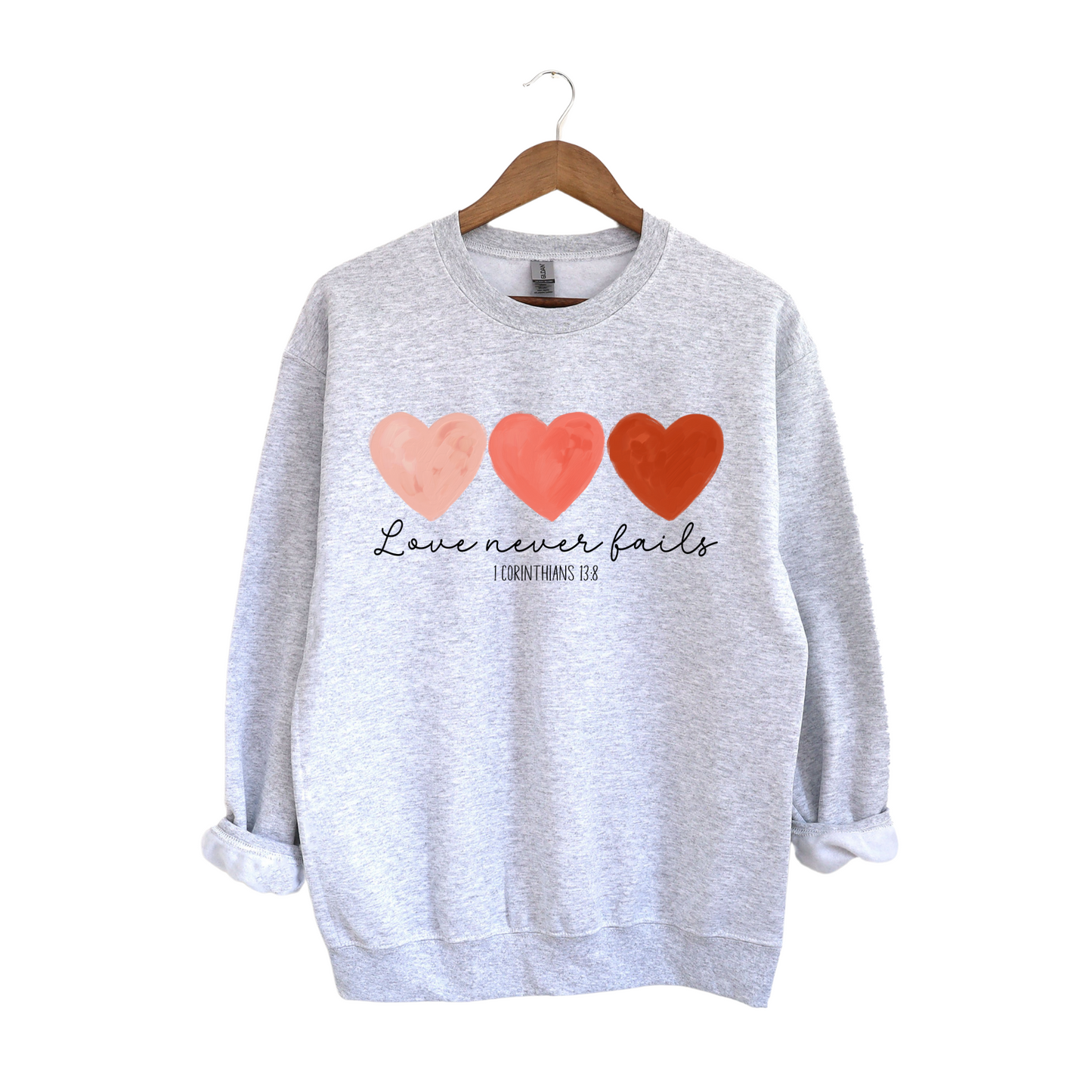 Love Never Fails Sweatshirt